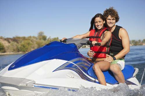 Couple on a jet ski in the water