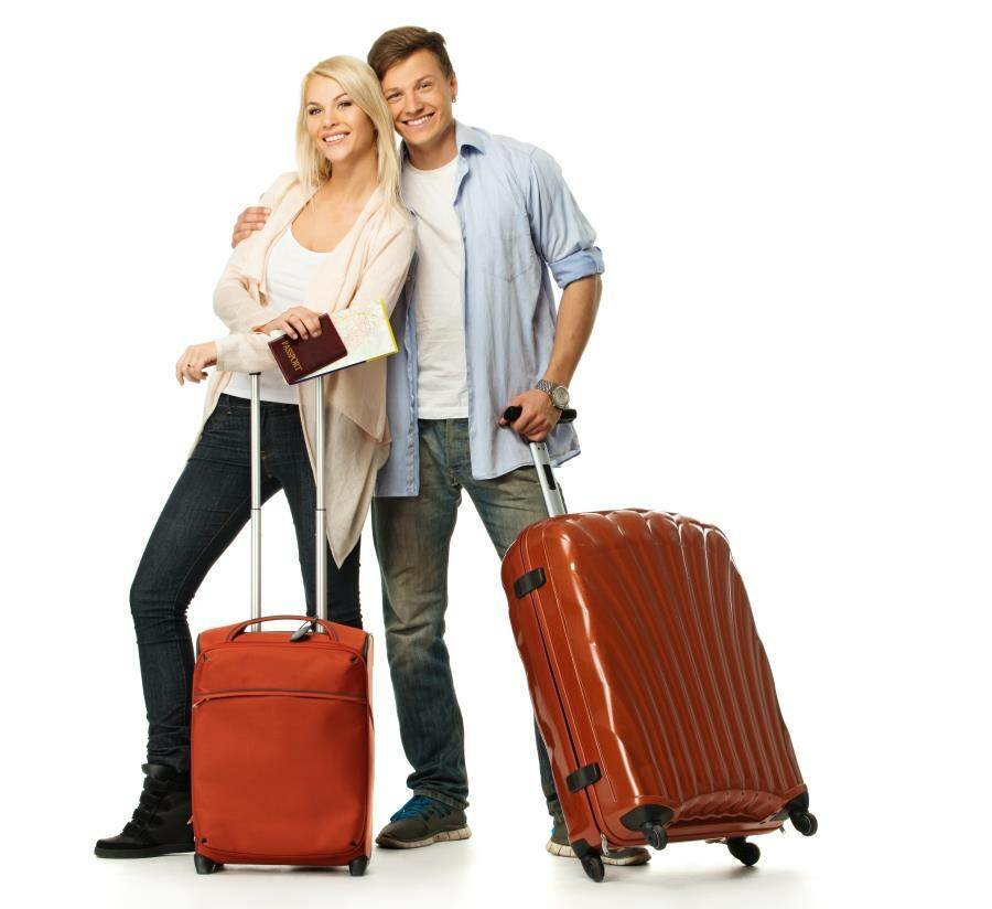 happy couple with luggage