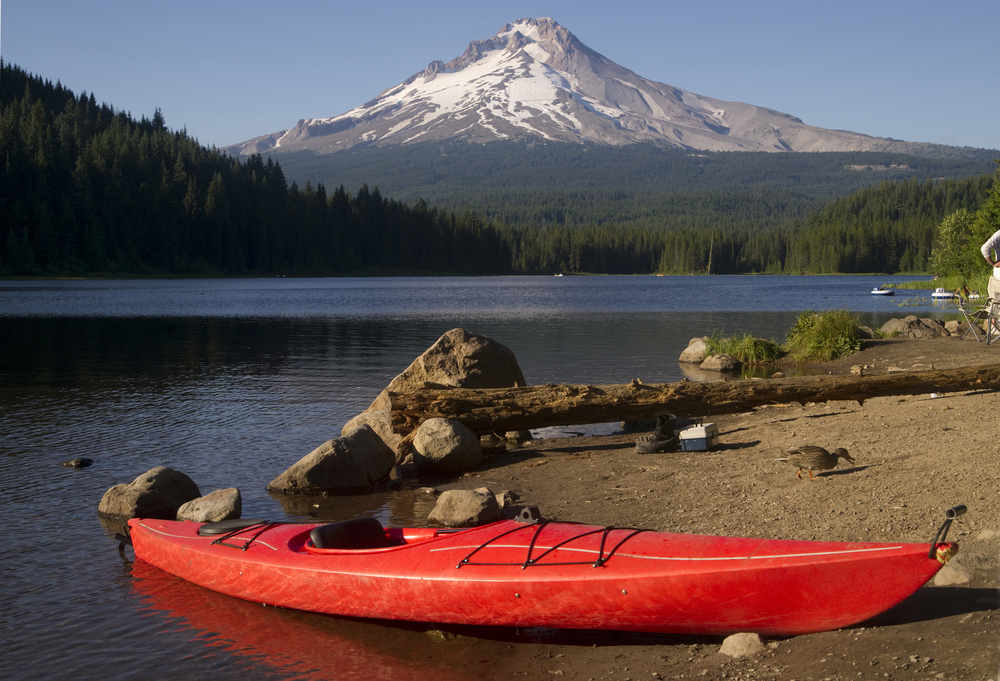 Kayak on the shore with Mount Hood in the background