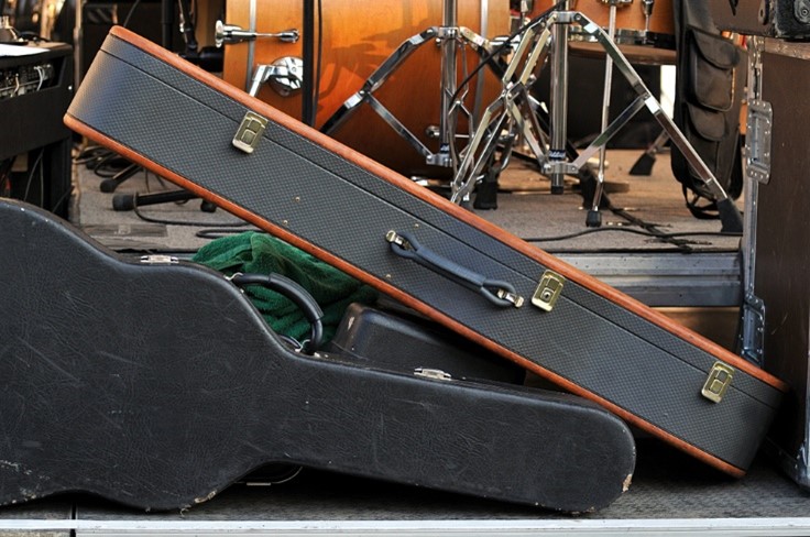 2 guitar cases one on another