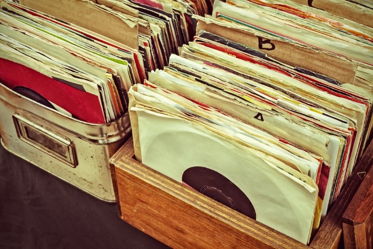 records in sleeves and stacked