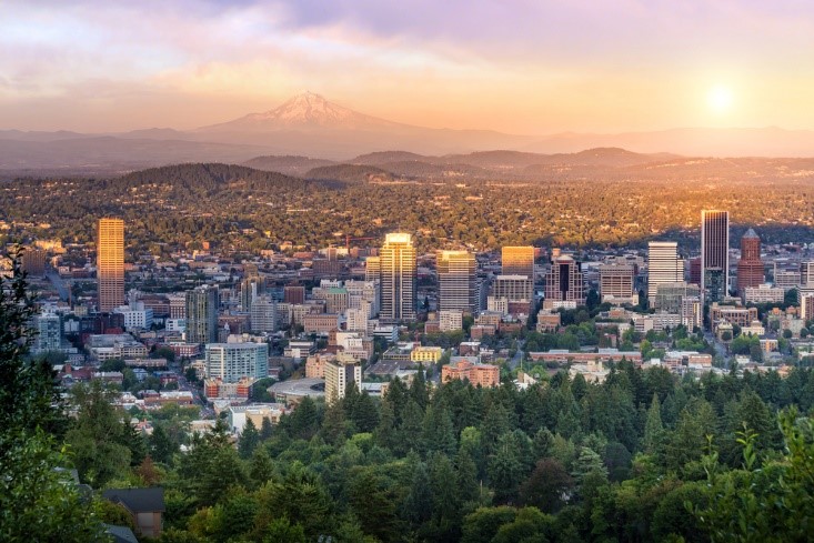 aerial photo of city in oregon with sunrise