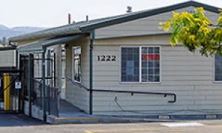 Front view of Northwest self storage facility in Prineville, OR on NW Madras Hwy