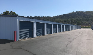 Drive up outdoor self storage units with roll up doors in The Dalles on W 7th St